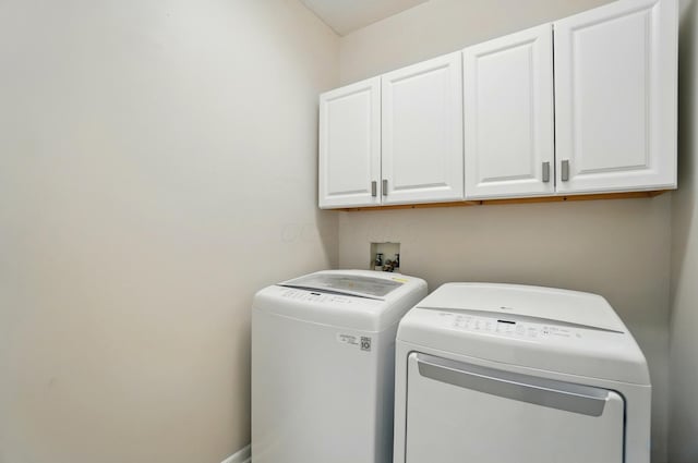 1940 Scioto Pointe Dr, Columbus, OH 43221 - laundry room featuring cabinet space and washer and dryer