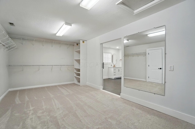 1940 Scioto Pointe Dr, Columbus, OH 43221 - spacious closet featuring carpet floors and attic access
