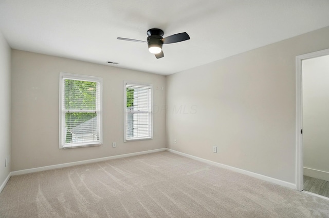 1940 Scioto Pointe Dr, Columbus, OH 43221 - unfurnished room with ceiling fan, light colored carpet, and baseboards