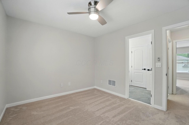 1940 Scioto Pointe Dr, Columbus, OH 43221 - unfurnished bedroom featuring carpet, baseboards, and ceiling fan