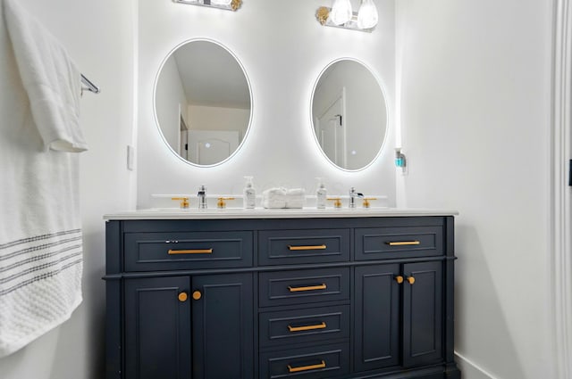 1940 Scioto Pointe Dr, Columbus, OH 43221 - bathroom featuring double vanity and baseboards