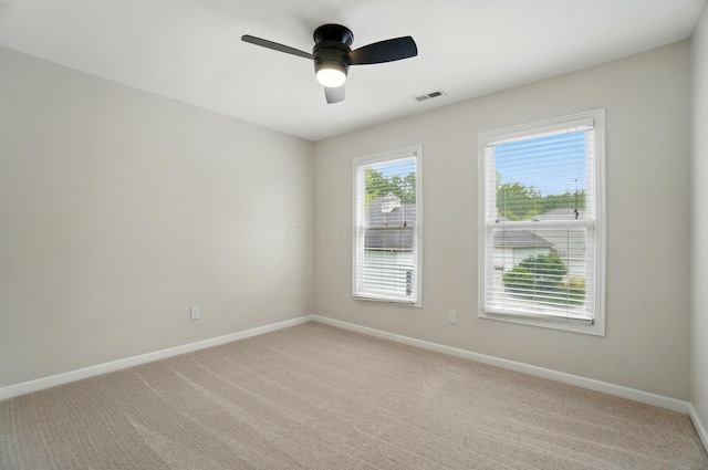 1940 Scioto Pointe Dr, Columbus, OH 43221 - empty room with baseboards, a ceiling fan, and light carpet