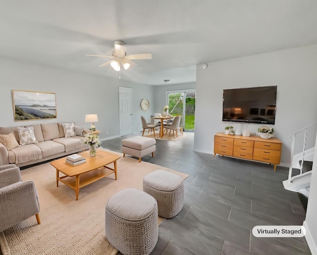living room with a ceiling fan