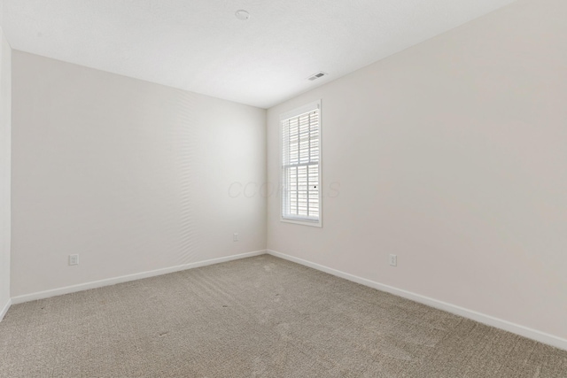 6039 Peck Ln, New Albany, OH 43054 - spare room with light carpet and baseboards