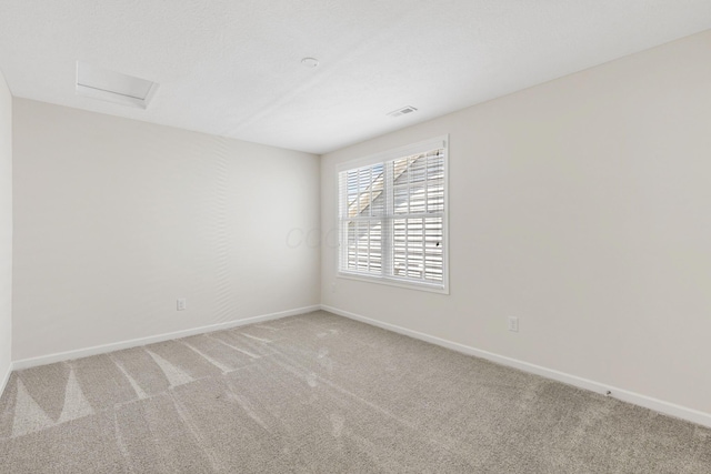 6039 Peck Ln, New Albany, OH 43054 - unfurnished room with light carpet, baseboards, and attic access