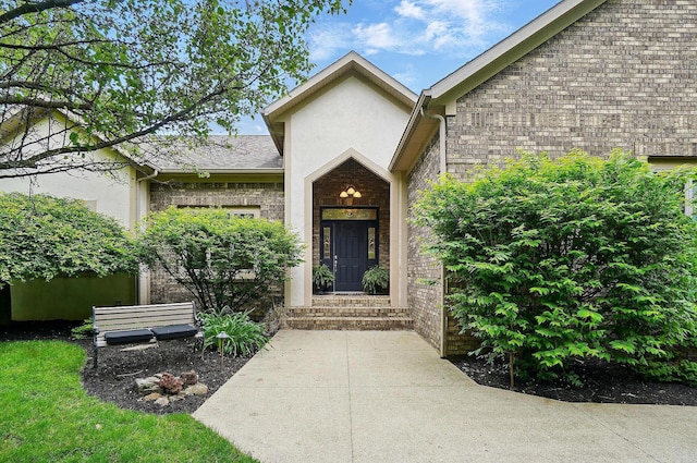 1092 George Allen Dr, South Vienna, OH 45369 - property entrance featuring brick siding and stucco siding