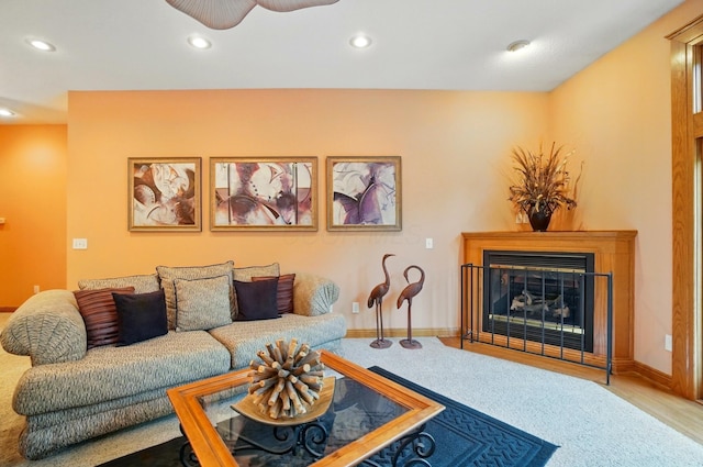 1092 George Allen Dr, South Vienna, OH 45369 - living room featuring recessed lighting, a glass covered fireplace, ceiling fan, and baseboards