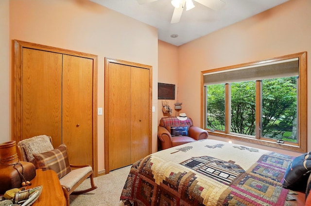 1092 George Allen Dr, South Vienna, OH 45369 - carpeted bedroom featuring two closets and ceiling fan