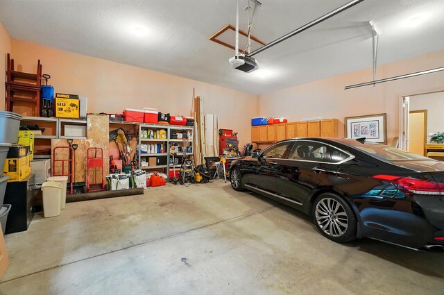 1092 George Allen Dr, South Vienna, OH 45369 - garage featuring a garage door opener