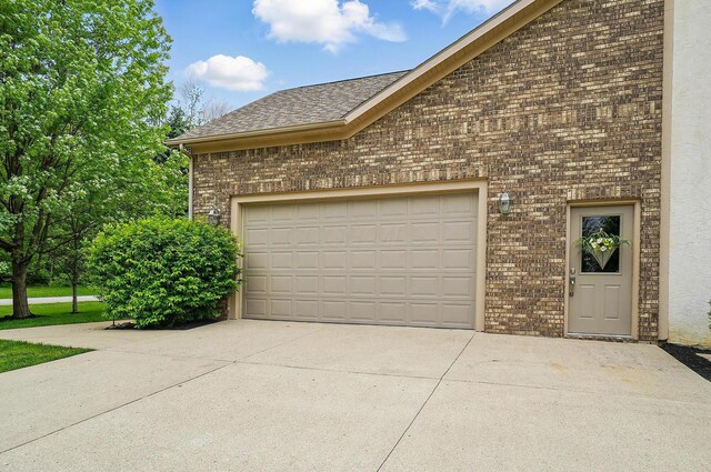 1092 George Allen Dr, South Vienna, OH 45369 - garage featuring concrete driveway