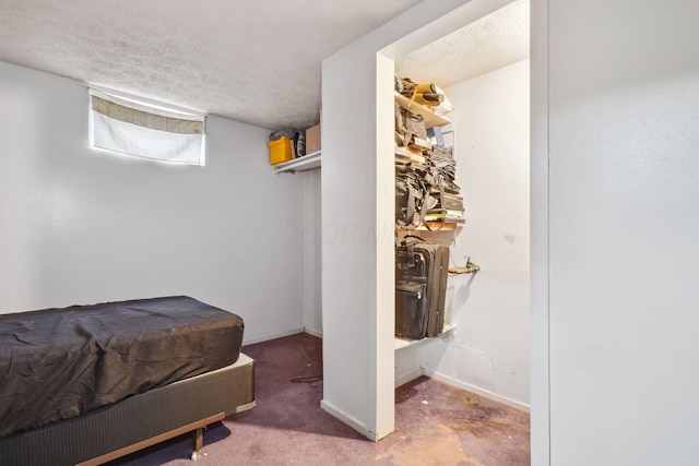 979 Westphal Ave, Columbus, OH 43227 - bedroom with a textured ceiling, carpet flooring, and baseboards