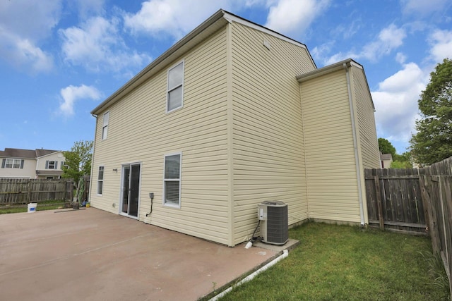 5504 Rothermund Dr, Canal Winchester, OH 43110 - back of house with central AC and a patio area
