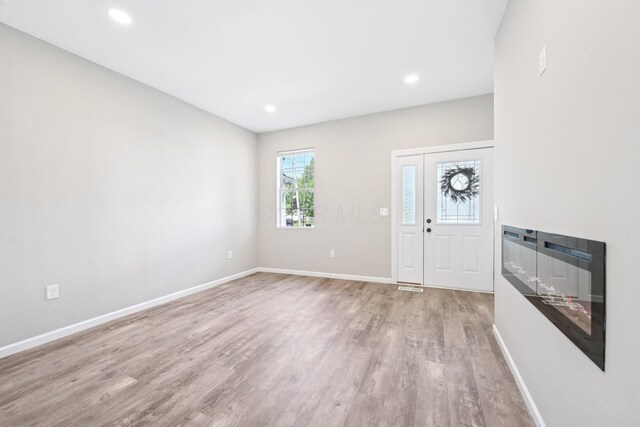 434 S Champion Ave, Columbus, OH 43205 - foyer entrance featuring light wood-type flooring and recessed lighting