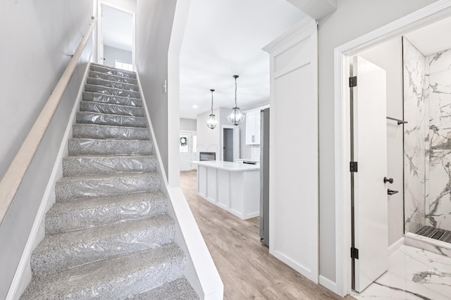 434 S Champion Ave, Columbus, OH 43205 - staircase featuring wood finished floors