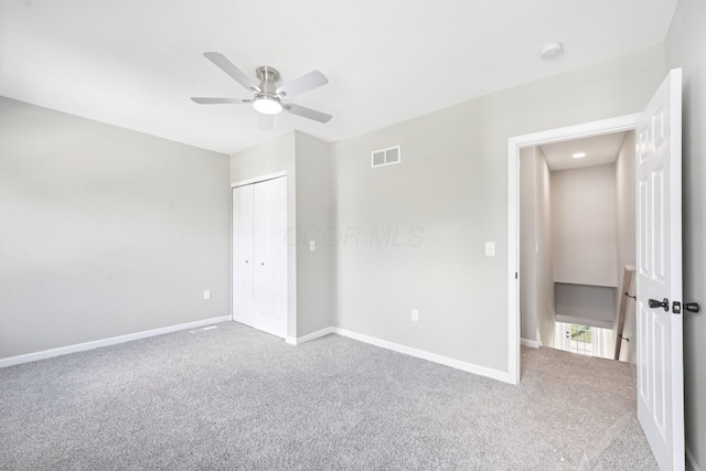 434 S Champion Ave, Columbus, OH 43205 - unfurnished bedroom with carpet flooring, a closet, and a ceiling fan