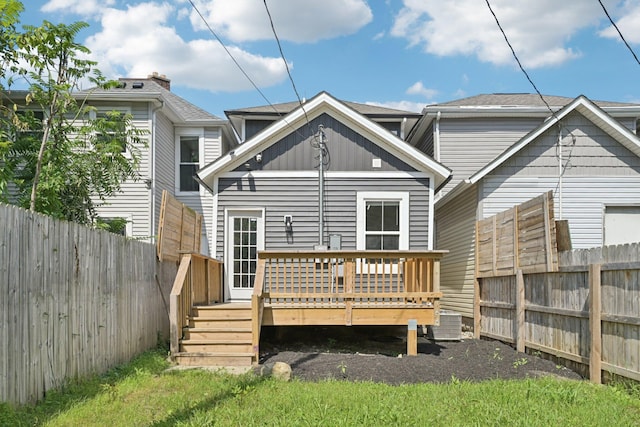 434 S Champion Ave, Columbus, OH 43205 - rear view of house with a deck, a fenced backyard, and board and batten siding