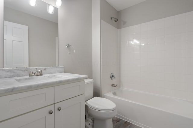 4526 Hoffman Farms Dr, Hilliard, OH 43026 - full bathroom with toilet, tub / shower combination, vanity, and wood finished floors