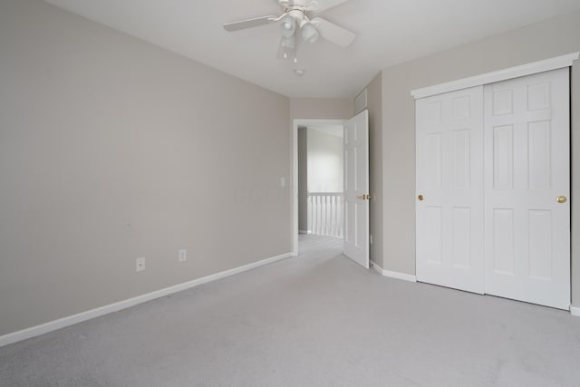 4526 Hoffman Farms Dr, Hilliard, OH 43026 - unfurnished bedroom with carpet flooring, baseboards, a closet, and a ceiling fan