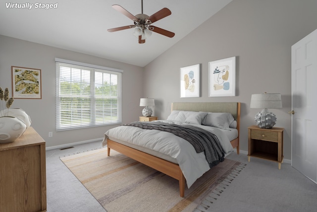 4526 Hoffman Farms Dr, Hilliard, OH 43026 - bedroom with light carpet, baseboards, high vaulted ceiling, and ceiling fan