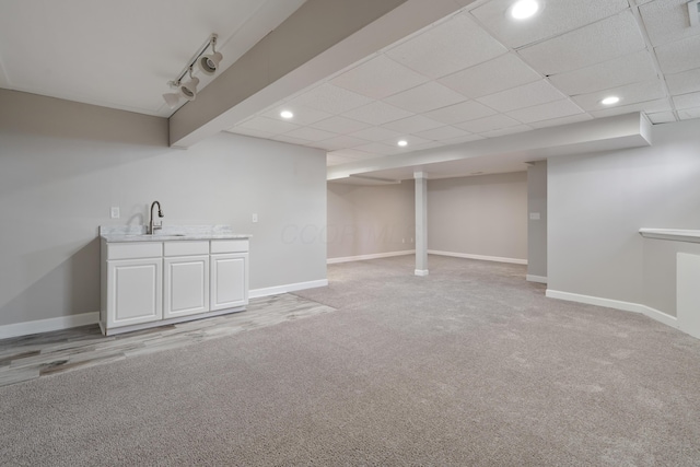 4526 Hoffman Farms Dr, Hilliard, OH 43026 - finished below grade area with recessed lighting, light colored carpet, a sink, and baseboards