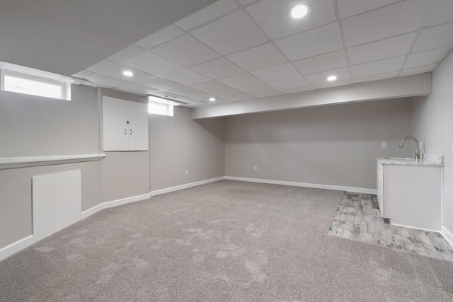 4526 Hoffman Farms Dr, Hilliard, OH 43026 - below grade area with light colored carpet, recessed lighting, baseboards, a sink, and a drop ceiling