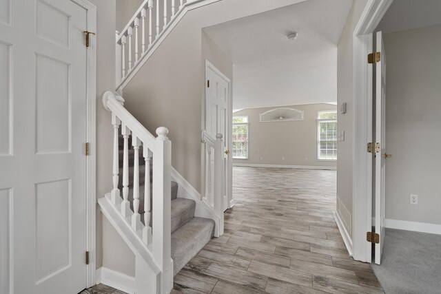 4526 Hoffman Farms Dr, Hilliard, OH 43026 - stairway with wood finished floors and baseboards