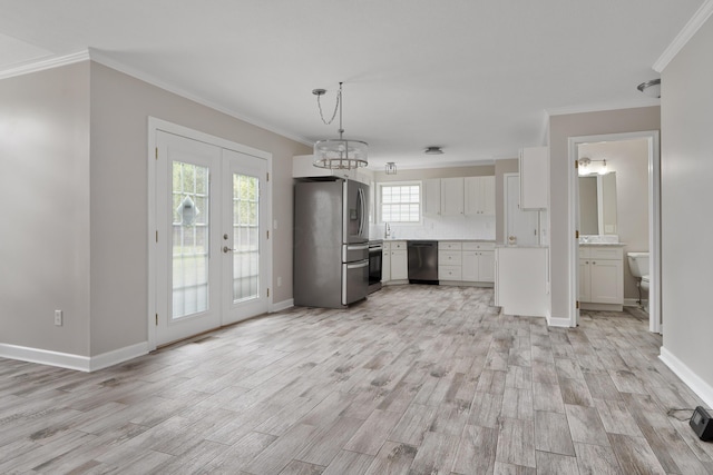 4526 Hoffman Farms Dr, Hilliard, OH 43026 - kitchen featuring stainless steel appliances, french doors, ornamental molding, light wood finished floors, and light countertops