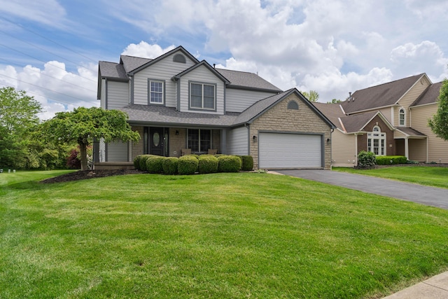 4526 Hoffman Farms Dr, Hilliard, OH 43026 - traditional-style home with driveway, a garage, a front lawn, a porch, and a shingled roof