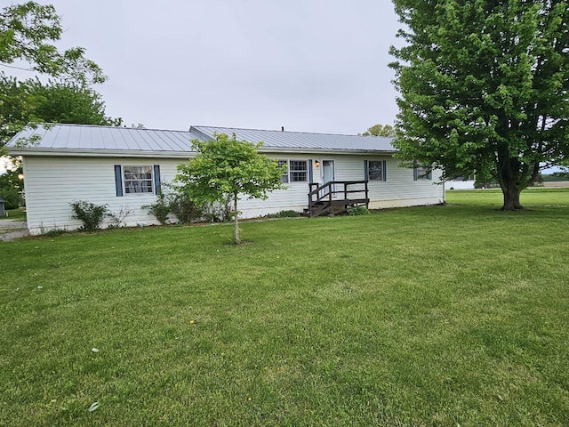 4280 Township Road 230, Cardington, OH 43315 - back of house featuring a yard and metal roof