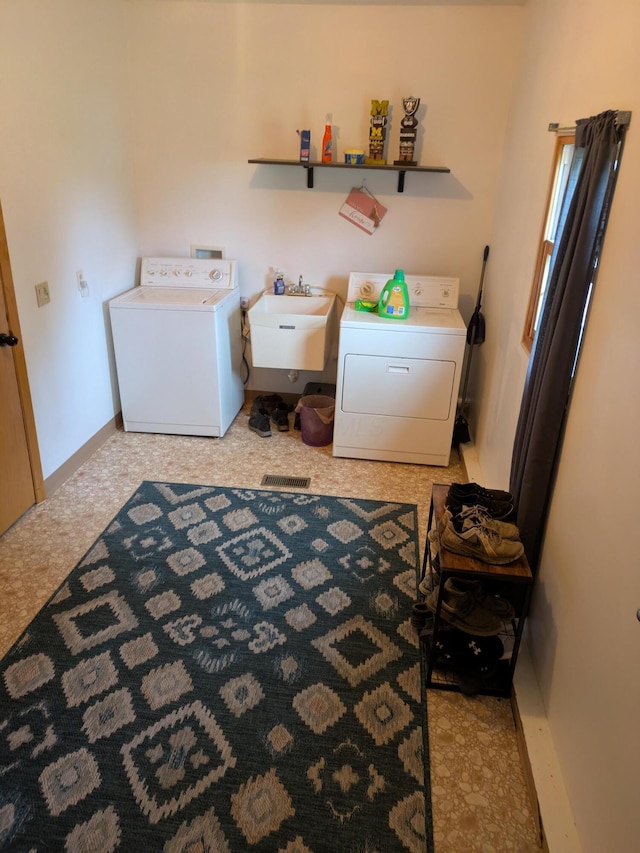 4280 Township Road 230, Cardington, OH 43315 - clothes washing area featuring washing machine and dryer