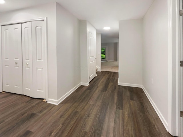 642 Ridenour Rd, Columbus, OH 43230 - hall with baseboards and dark wood finished floors