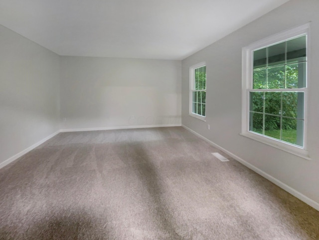 642 Ridenour Rd, Columbus, OH 43230 - carpeted spare room with baseboards