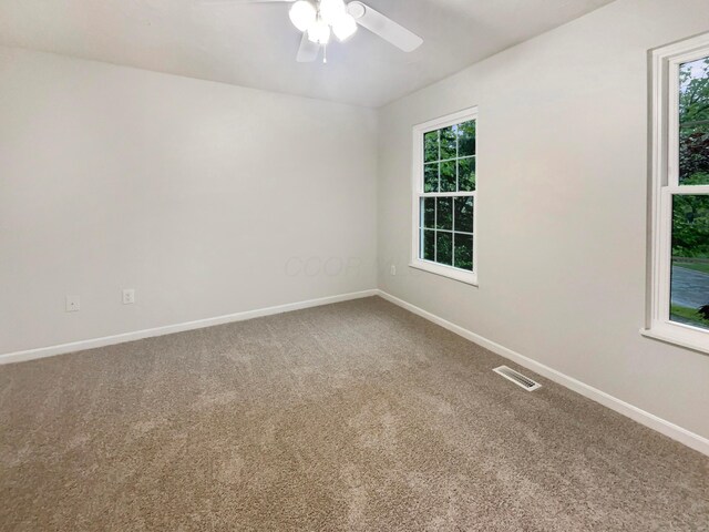 642 Ridenour Rd, Columbus, OH 43230 - carpeted empty room featuring baseboards and a ceiling fan