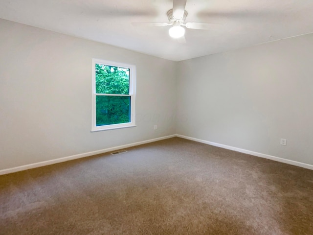 642 Ridenour Rd, Columbus, OH 43230 - spare room featuring ceiling fan, carpet flooring, and baseboards