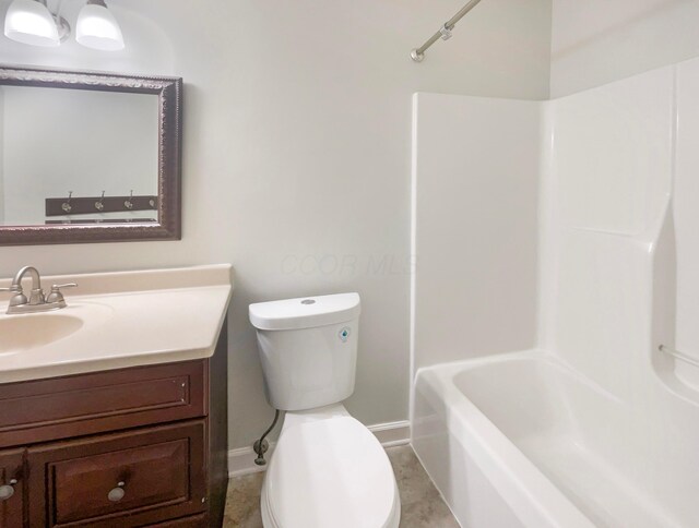 642 Ridenour Rd, Columbus, OH 43230 - bathroom featuring baseboards, toilet, and vanity