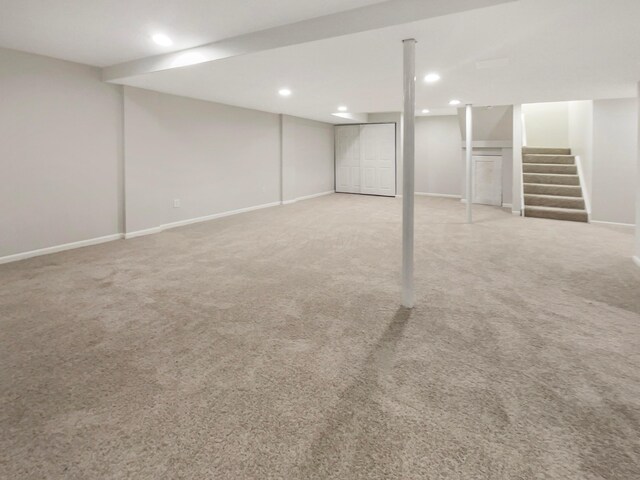 642 Ridenour Rd, Columbus, OH 43230 - finished basement featuring carpet floors, recessed lighting, stairway, and baseboards