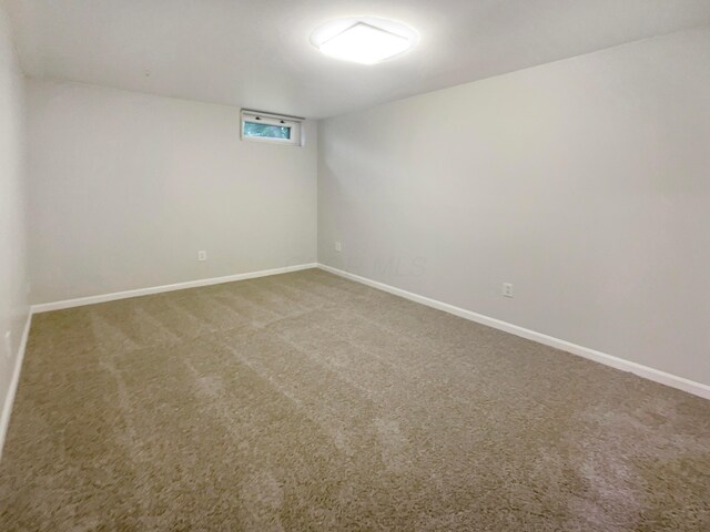 642 Ridenour Rd, Columbus, OH 43230 - carpeted empty room featuring baseboards