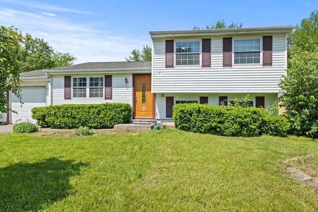 2267 Anndel Ct, Grove City, OH 43123 - split level home with a garage and a front lawn