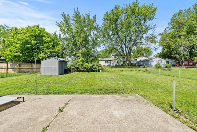 2267 Anndel Ct, Grove City, OH 43123 - view of yard featuring an outbuilding, a storage shed, and a patio area
