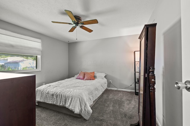2267 Anndel Ct, Grove City, OH 43123 - bedroom featuring dark carpet, baseboards, and ceiling fan