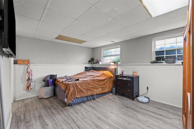 2267 Anndel Ct, Grove City, OH 43123 - bedroom with a paneled ceiling, wood finished floors, and a wainscoted wall