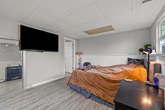 2267 Anndel Ct, Grove City, OH 43123 - bedroom featuring wood finished floors, a drop ceiling, and baseboards