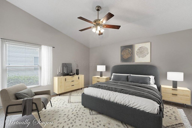 1275 Shelby Cir, Reynoldsburg, OH 43068 - bedroom with vaulted ceiling, carpet flooring, ceiling fan, and baseboards