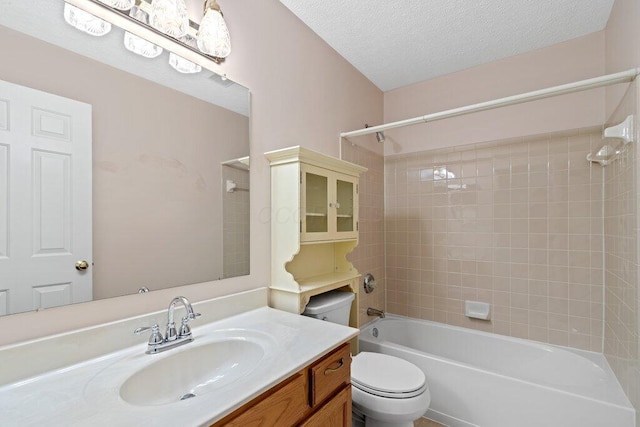 1275 Shelby Cir, Reynoldsburg, OH 43068 - full bathroom featuring toilet, vanity, shower / tub combination, and a textured ceiling