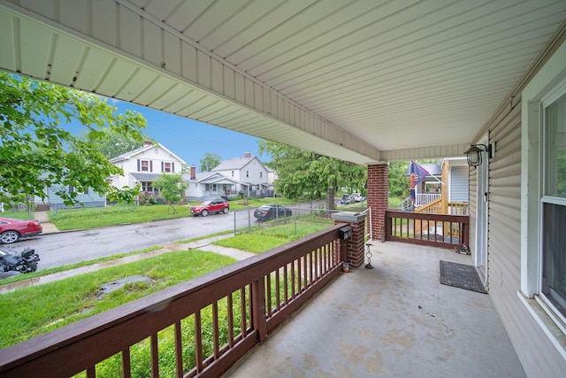 799 E Deshler Ave, Columbus, OH 43206 - porch featuring a residential view and a yard