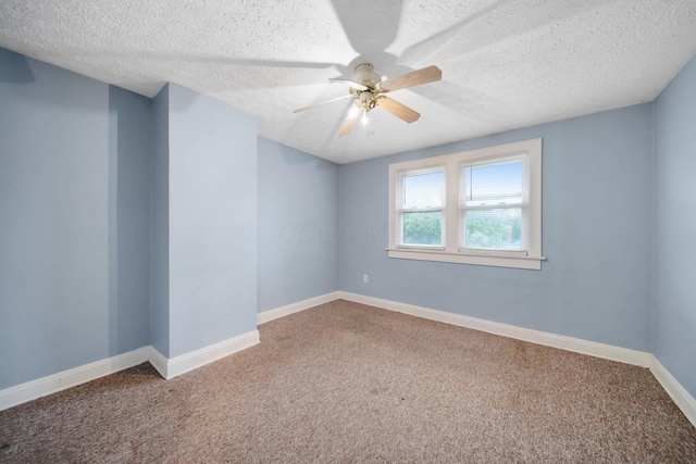 799 E Deshler Ave, Columbus, OH 43206 - unfurnished room featuring carpet floors, a ceiling fan, a textured ceiling, and baseboards