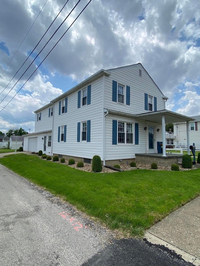 1236 8th Ave, Lancaster, OH 43130 - view of front facade with covered porch, a garage, and a front yard