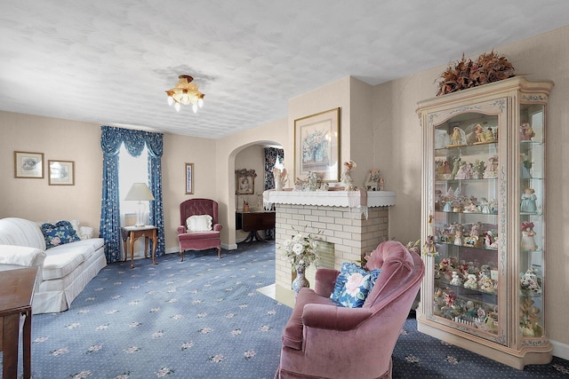 1236 8th Ave, Lancaster, OH 43130 - living area with arched walkways, carpet, and baseboards