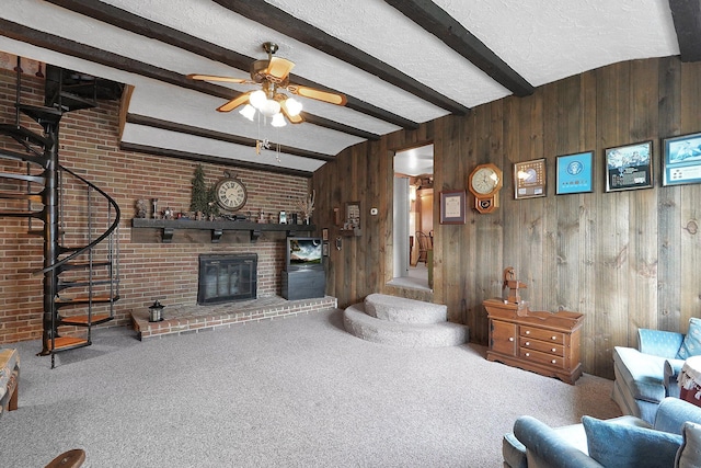 1236 8th Ave, Lancaster, OH 43130 - living room featuring stairs, beamed ceiling, a fireplace, carpet, and wood walls