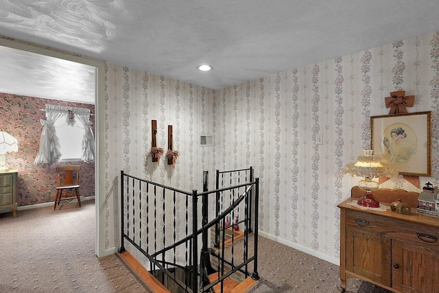 1236 8th Ave, Lancaster, OH 43130 - corridor with an upstairs landing, baseboards, and carpet flooring